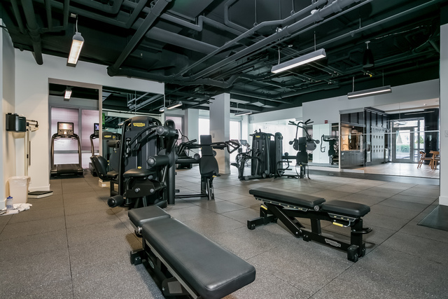 2 West Delaware Place, Unit 504 Chicago, IL 60610 - Photo 19 of 24 a view of a room with gym equipment