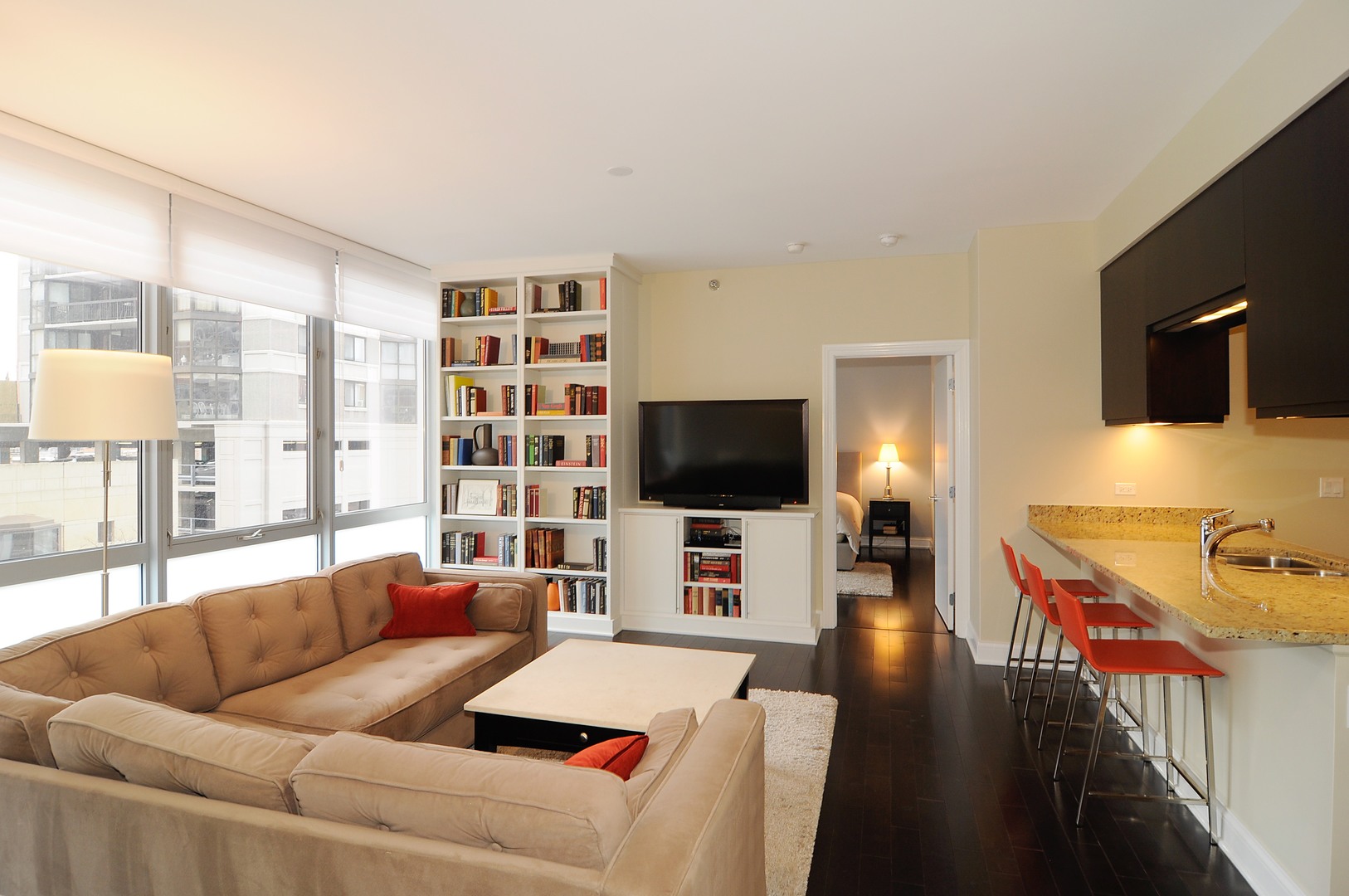 2 West Delaware Place, Unit 504 Chicago, IL 60610 - Photo 3 of 24 a living room with furniture and a flat screen tv