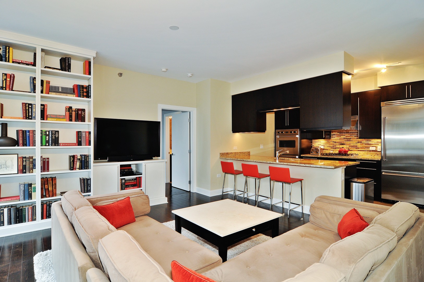 2 West Delaware Place, Unit 504 Chicago, IL 60610 - Photo 5 of 24 a living room with furniture and a flat screen tv