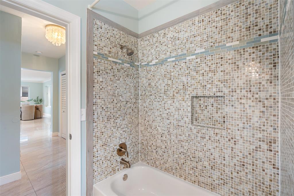 741 Fairway Drive Miami Beach, FL 33141 - Photo 26 of 50 a bathroom with a shower