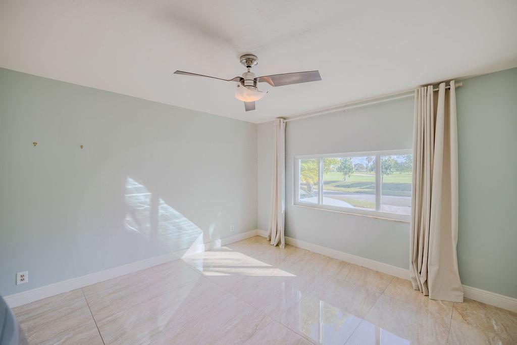 741 Fairway Drive Miami Beach, FL 33141 - Photo 28 of 50 a view of an empty room with a window