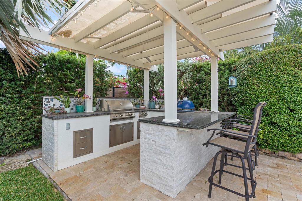 741 Fairway Drive Miami Beach, FL 33141 - Photo 33 of 50 a outdoor space with chairs