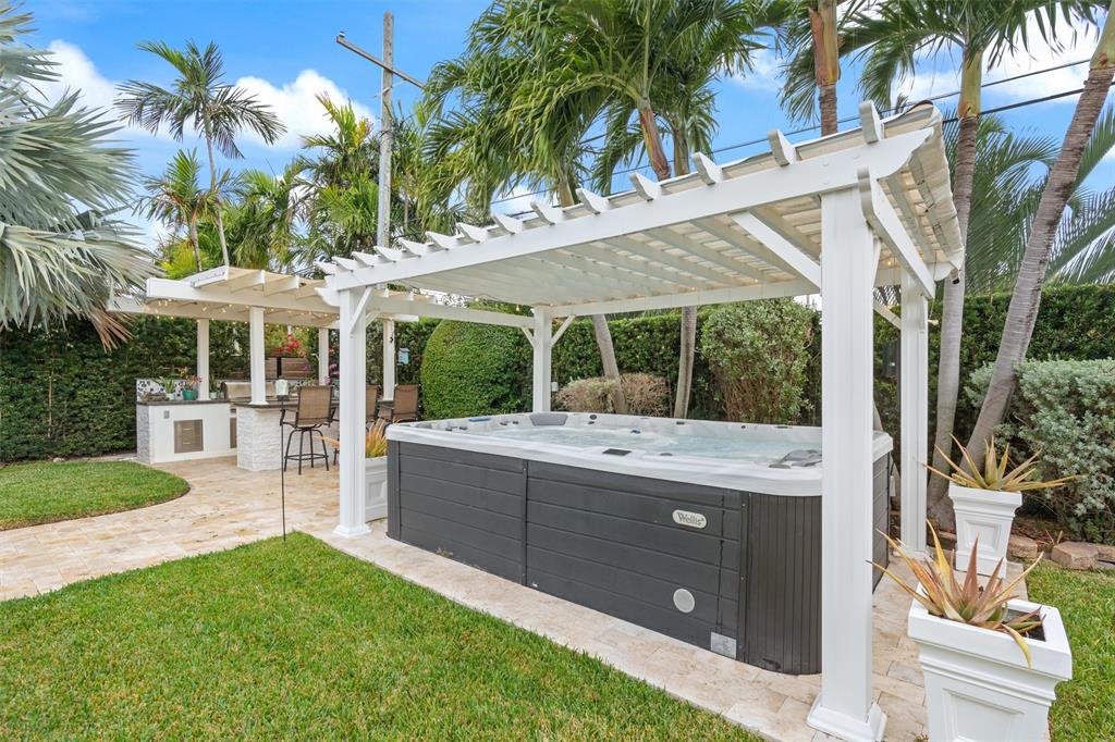 741 Fairway Drive Miami Beach, FL 33141 - Photo 36 of 50 a view of a house with a tub and a yard