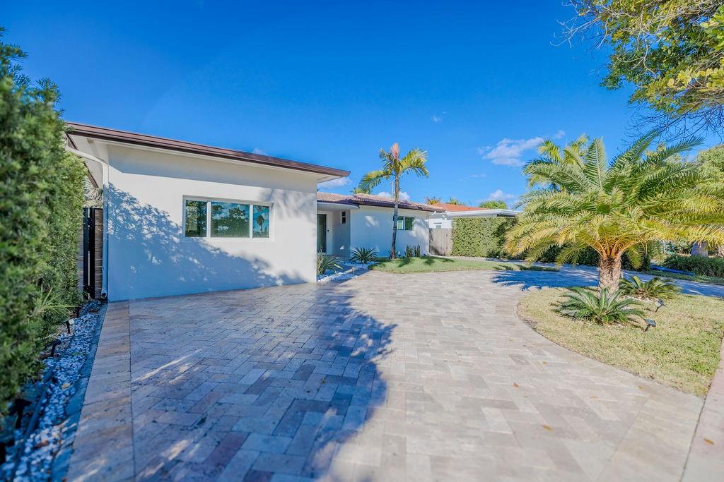 741 Fairway Drive Miami Beach, FL 33141 - Photo 41 of 50 a view of a house with a yard