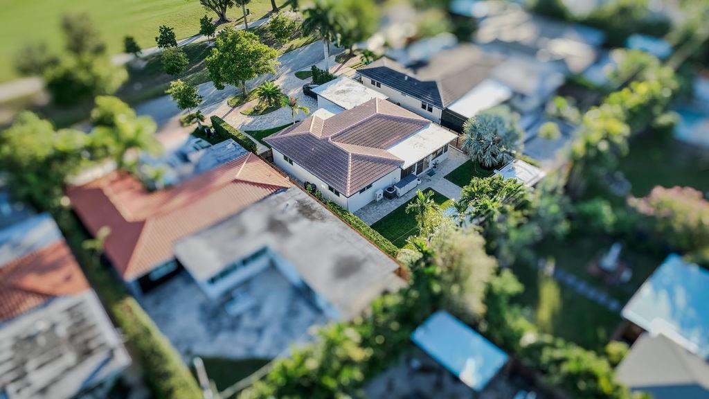741 Fairway Drive Miami Beach, FL 33141 - Photo 43 of 50 an aerial view of a house with a yard