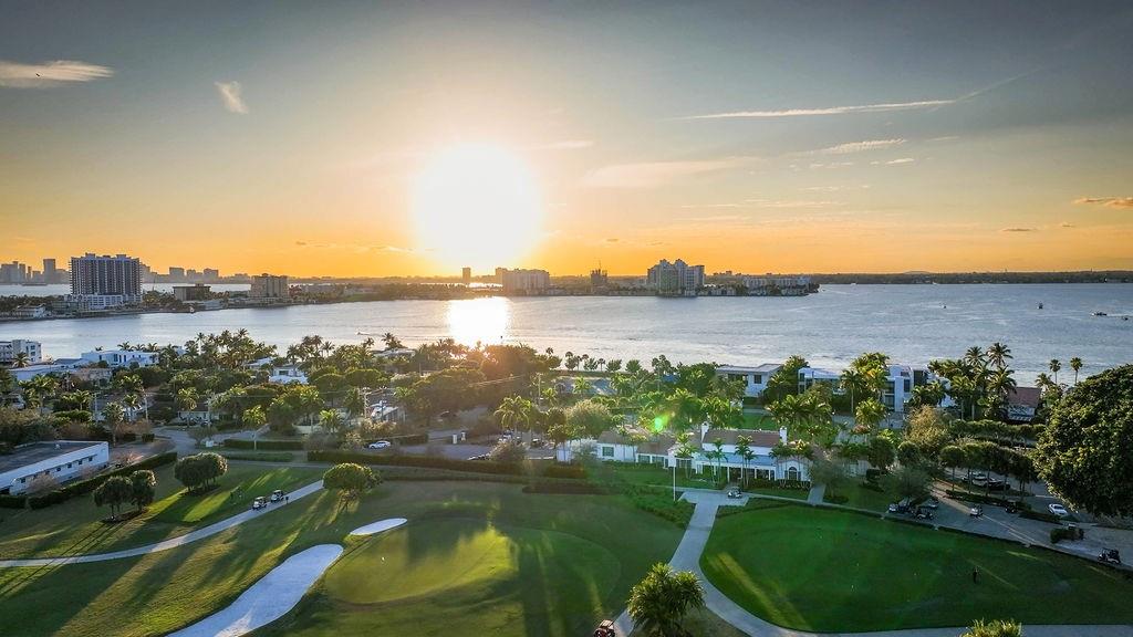741 Fairway Drive Miami Beach, FL 33141 - Photo 49 of 50 a view of a lake with a building in the background