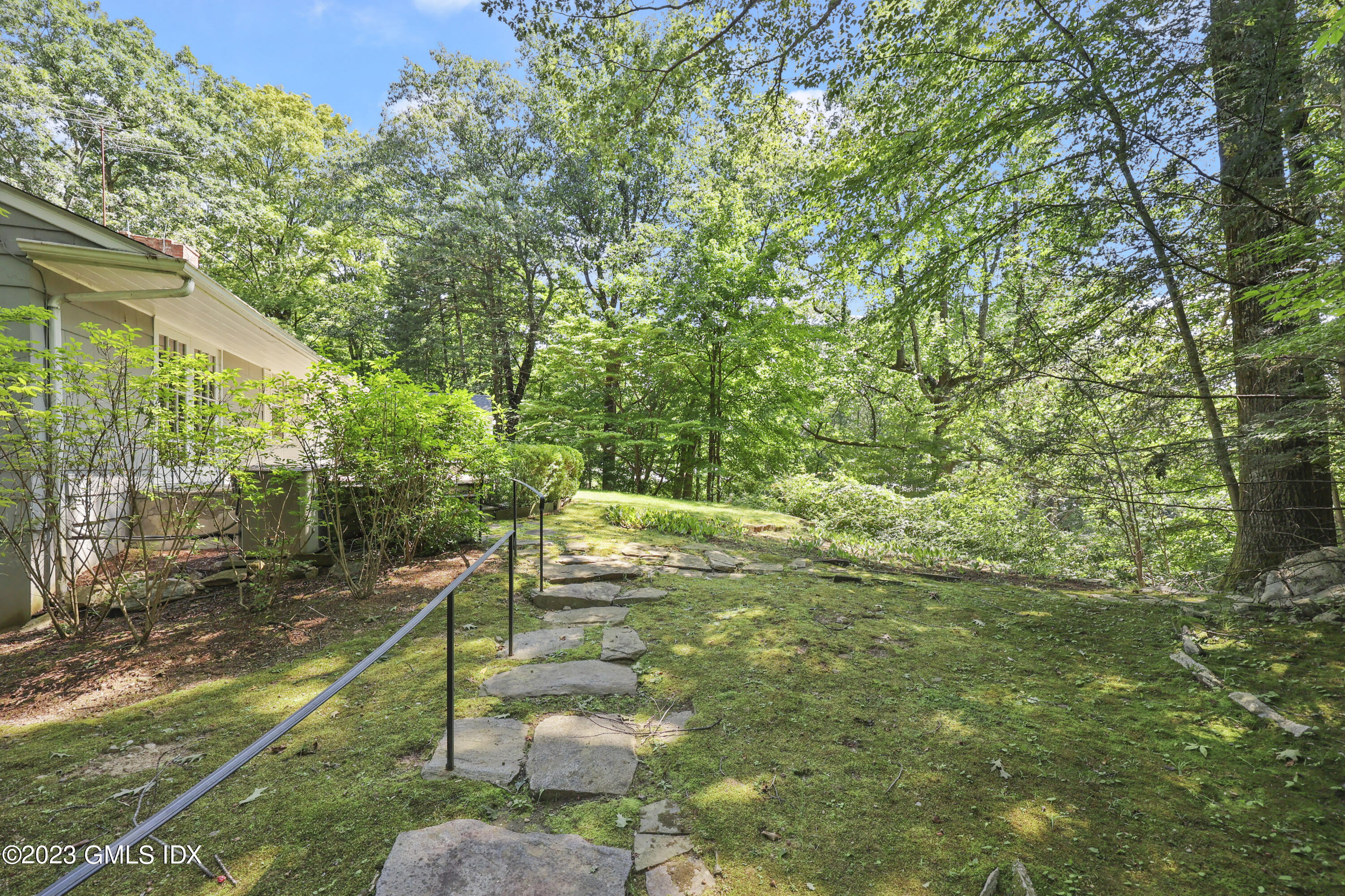 10 Woodchuck Road Stamford, CT 06903 - Photo 23 of 28 a view of a backyard