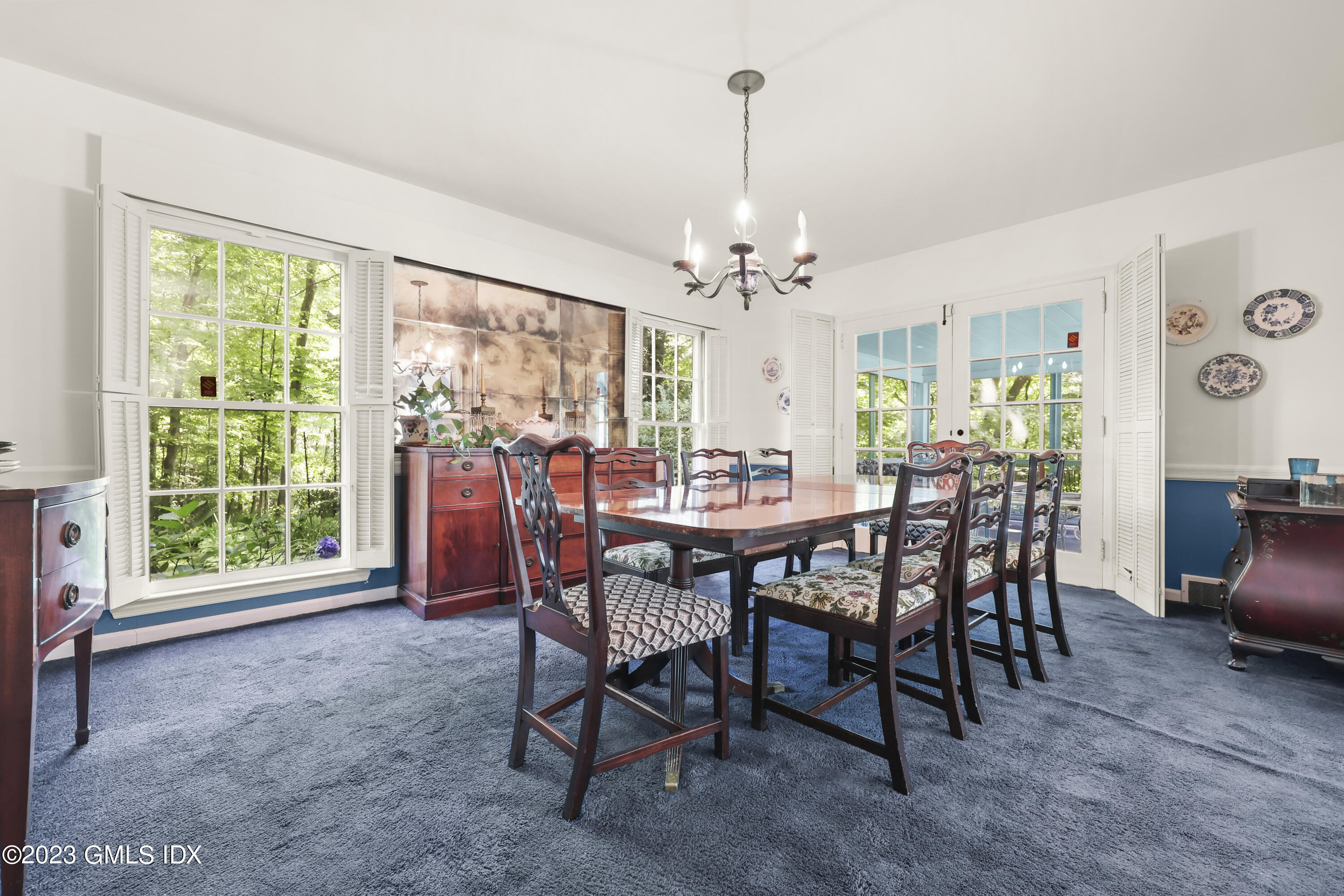 10 Woodchuck Road Stamford, CT 06903 - Photo 9 of 28 a view of a dining room with furniture window and outside view