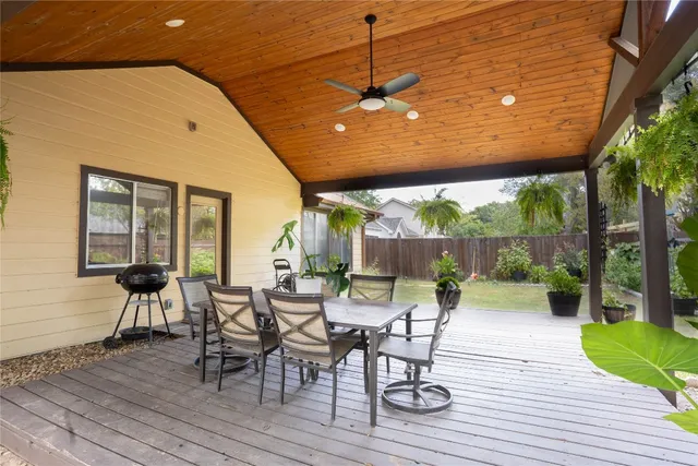 a view of a patio with furniture