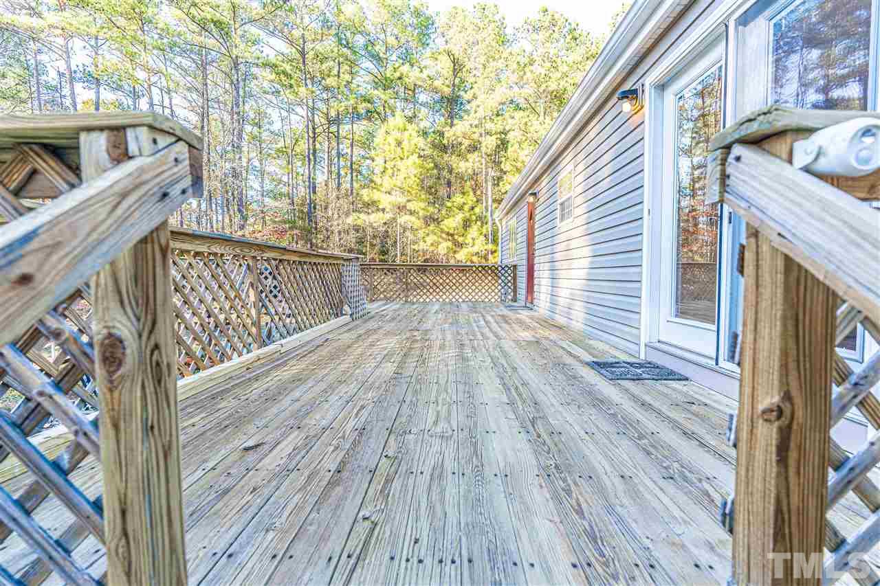 72 Cypress Farm Road Cameron, NC 28326 - Photo 21 of 28 a view of outdoor space with deck and kitchen