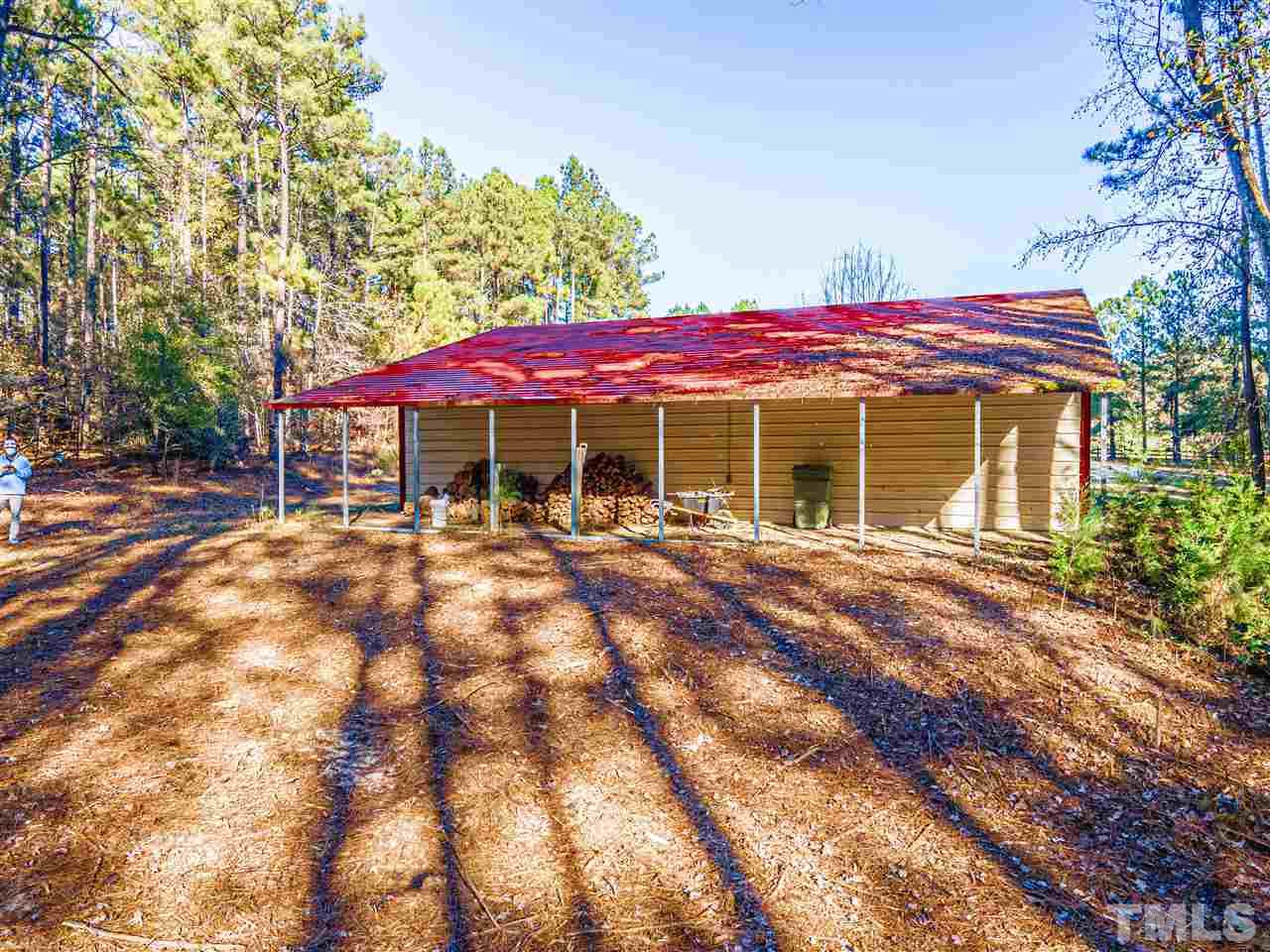 72 Cypress Farm Road Cameron, NC 28326 - Photo 25 of 28 a front view of a house with a yard