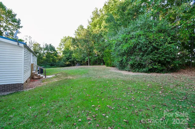 a view of a backyard with a garden