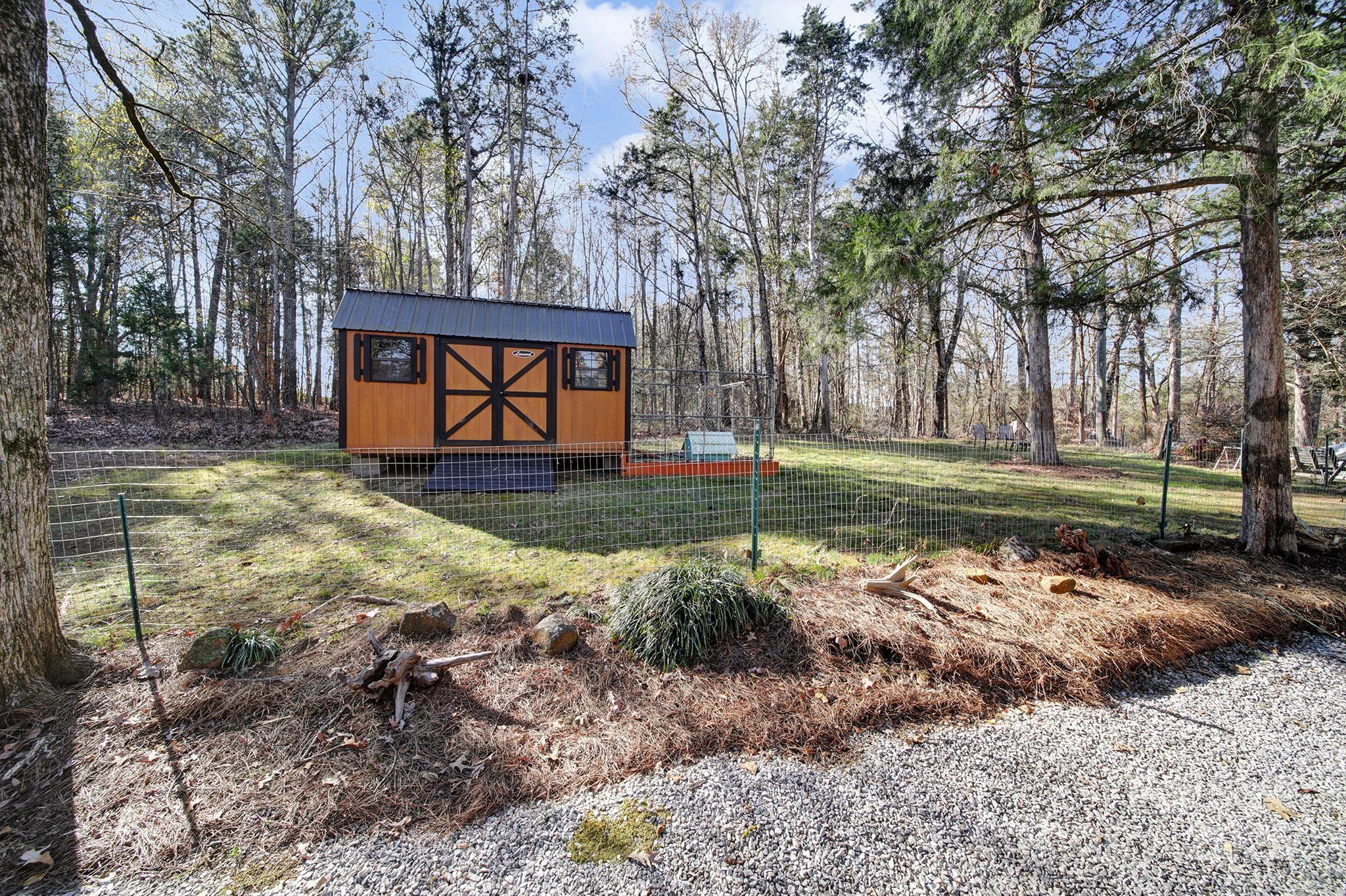 4289 Falcon Hall Way Rock Hill, SC 29730 - Photo 18 of 22 a view of a backyard with large trees
