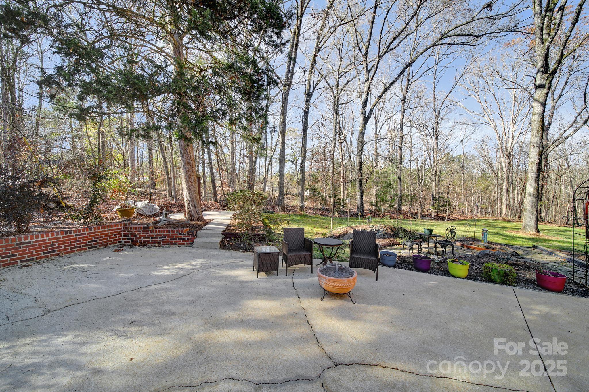 4289 Falcon Hall Way Rock Hill, SC 29730 - Photo 2 of 22 a view of a patio with swimming pool and patio
