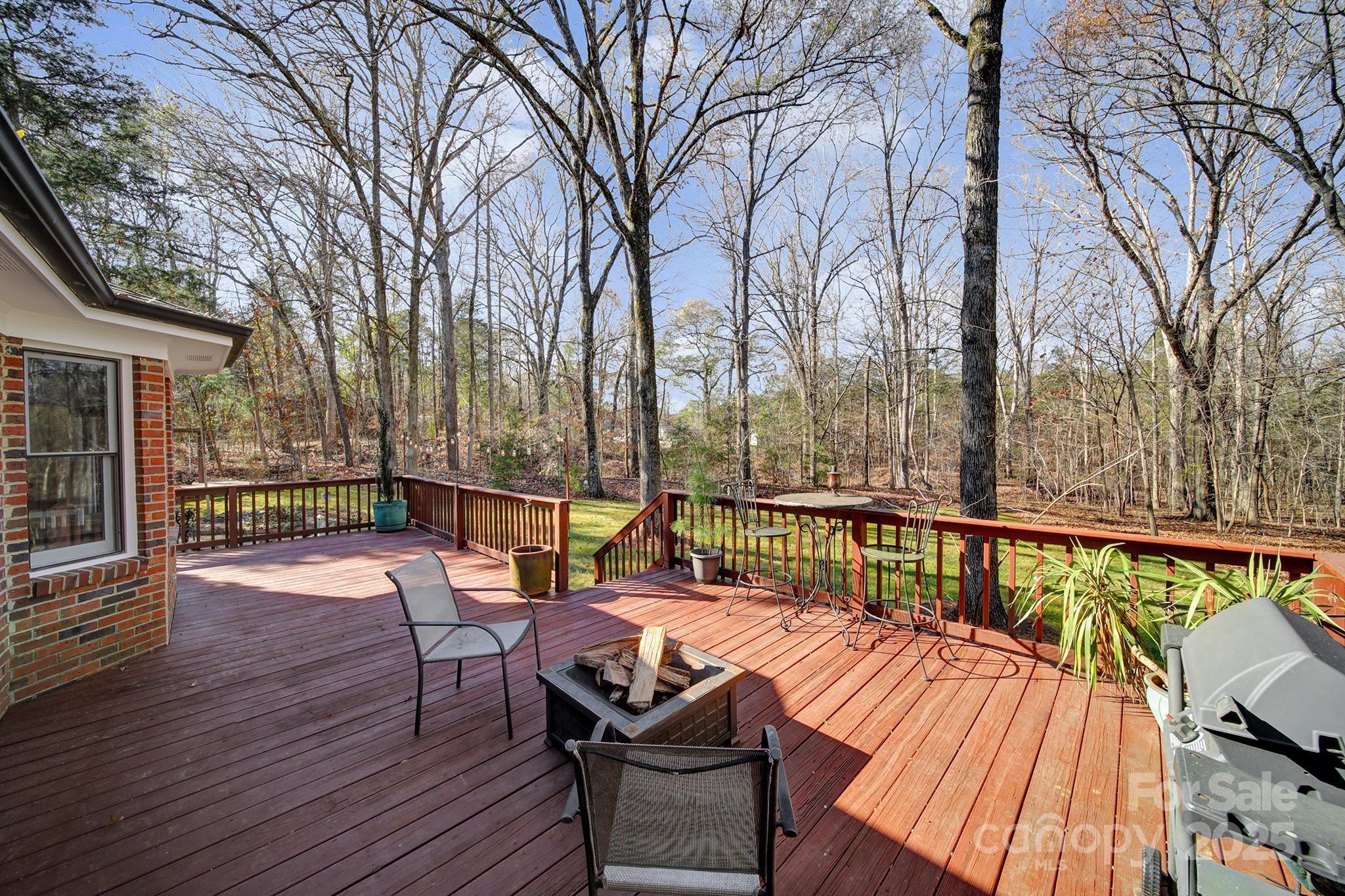 4289 Falcon Hall Way Rock Hill, SC 29730 - Photo 4 of 22 a view of a balcony with wooden floor and outdoor seating