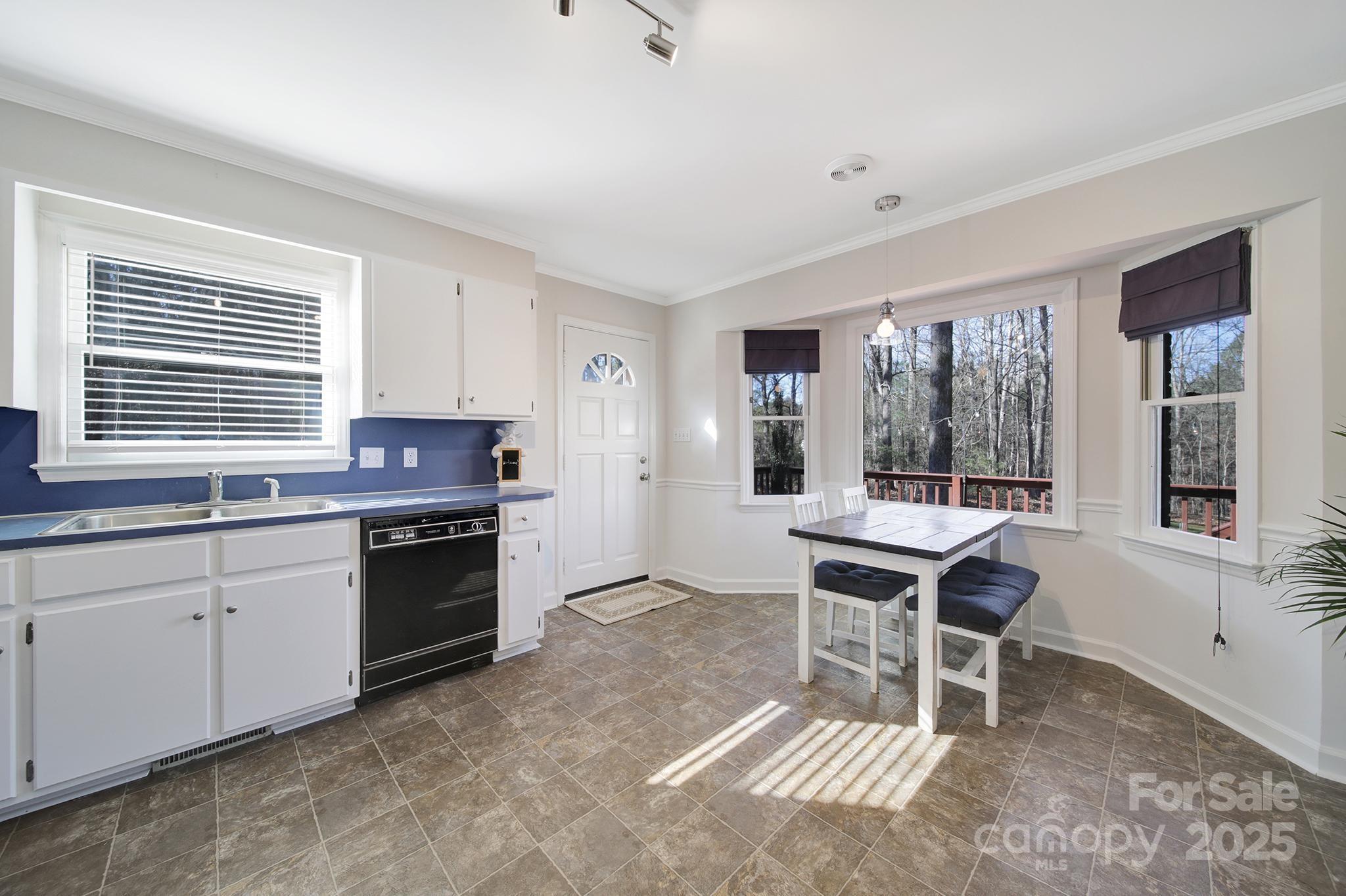 4289 Falcon Hall Way Rock Hill, SC 29730 - Photo 10 of 22 a kitchen with stainless steel appliances granite countertop a stove a sink and a refrigerator