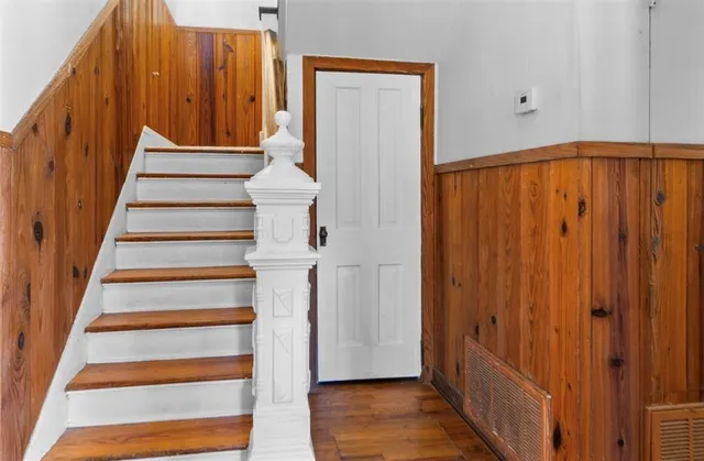 a view of entryway with wooden floor