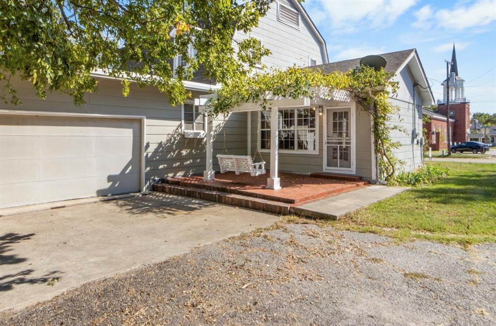501 East Dallas Avenue Cooper, TX 75432 - Photo 29 of 35 a view of a house with backyard