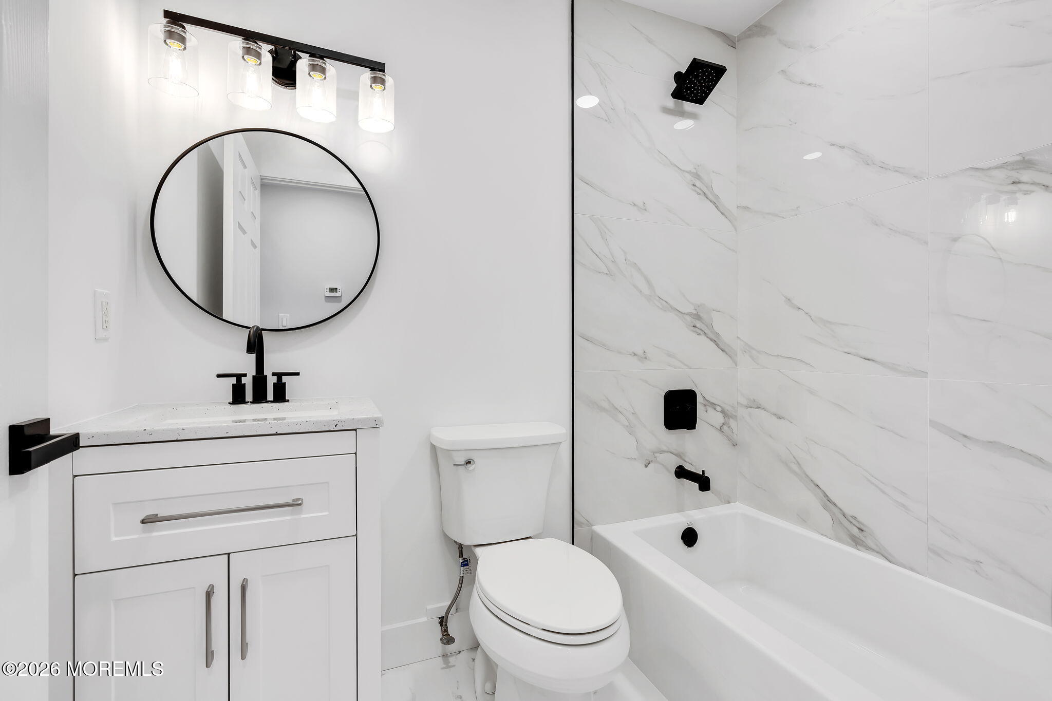 5 Jaffreyton Close Freehold, NJ 07728 - Photo 17 of 22 a bathroom with a sink a toilet and a bathtub