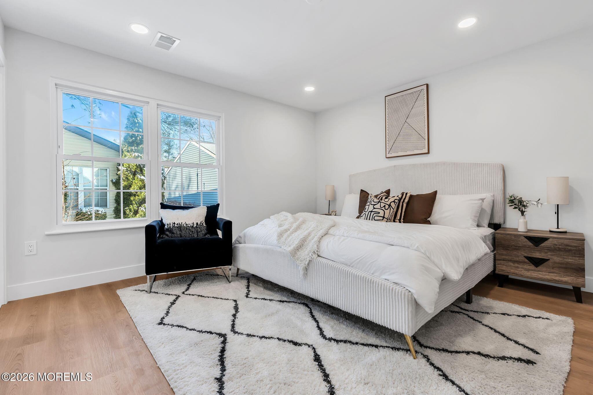 5 Jaffreyton Close Freehold, NJ 07728 - Photo 18 of 22 a bedroom with a bed and a couch