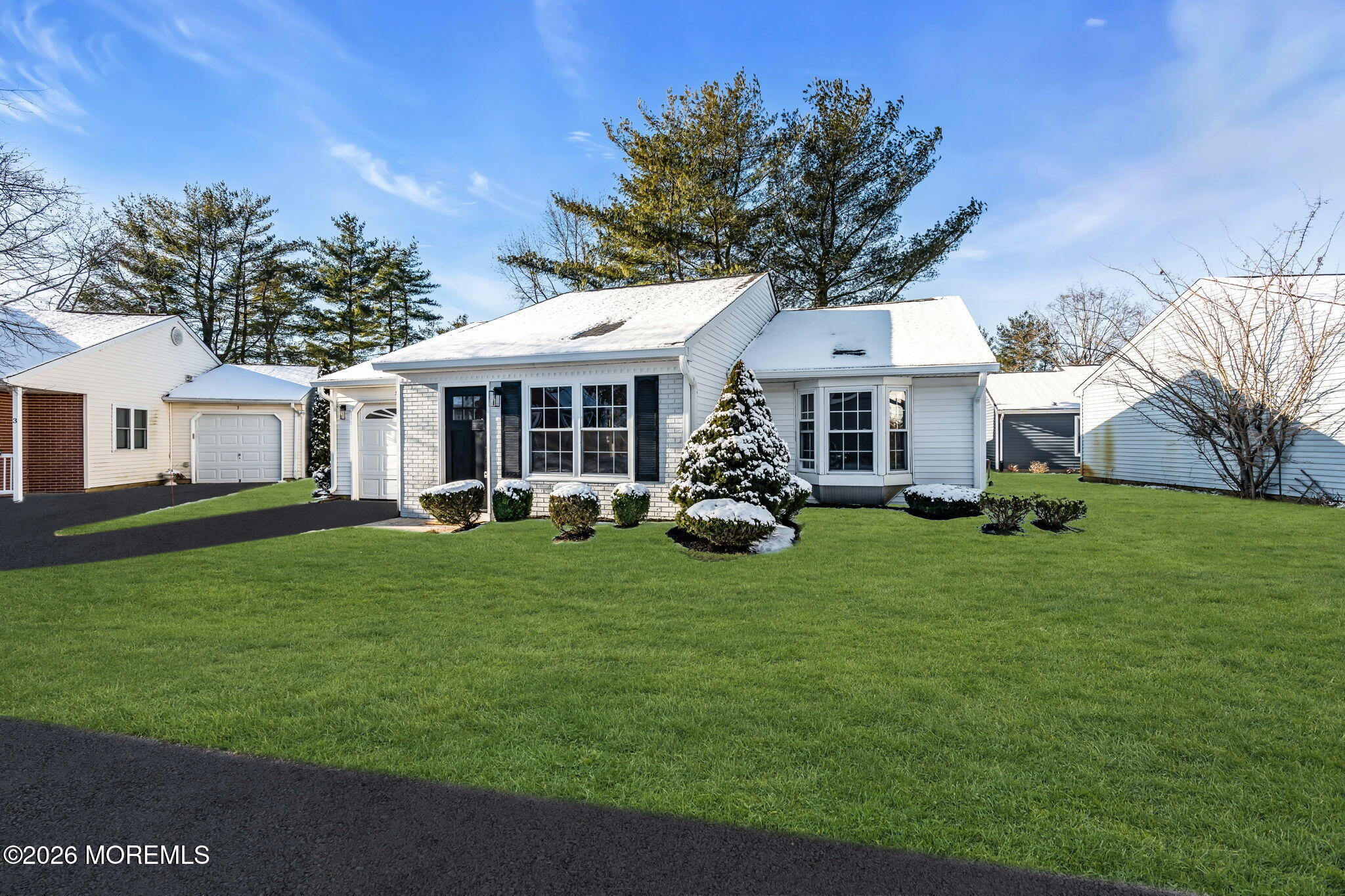 5 Jaffreyton Close Freehold, NJ 07728 - Photo 2 of 22 a front view of a house with a yard table and porch