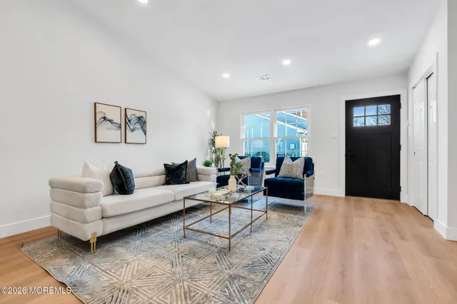 a living room with furniture and a couch