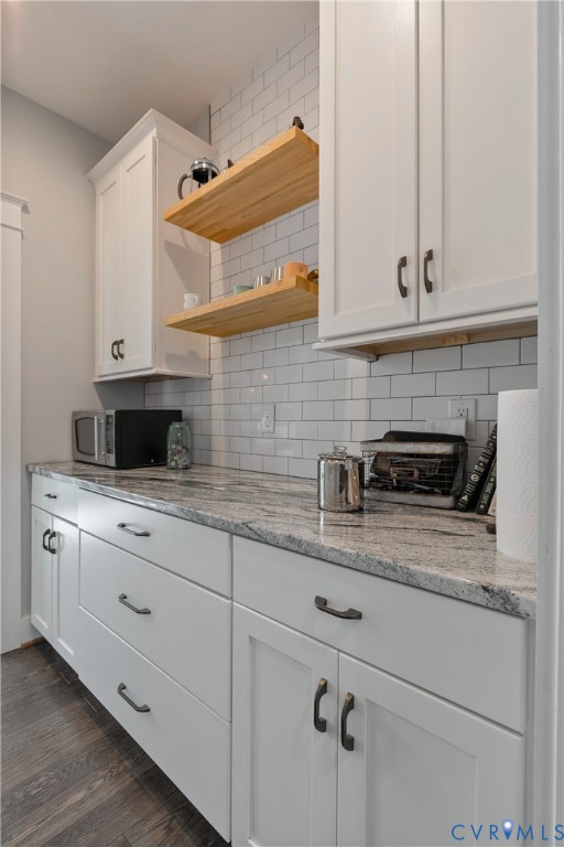 9749 Hoke Brady Road Henrico, VA 23231 - Photo 19 of 53 a kitchen with stainless steel appliances granite countertop white cabinets and a stove