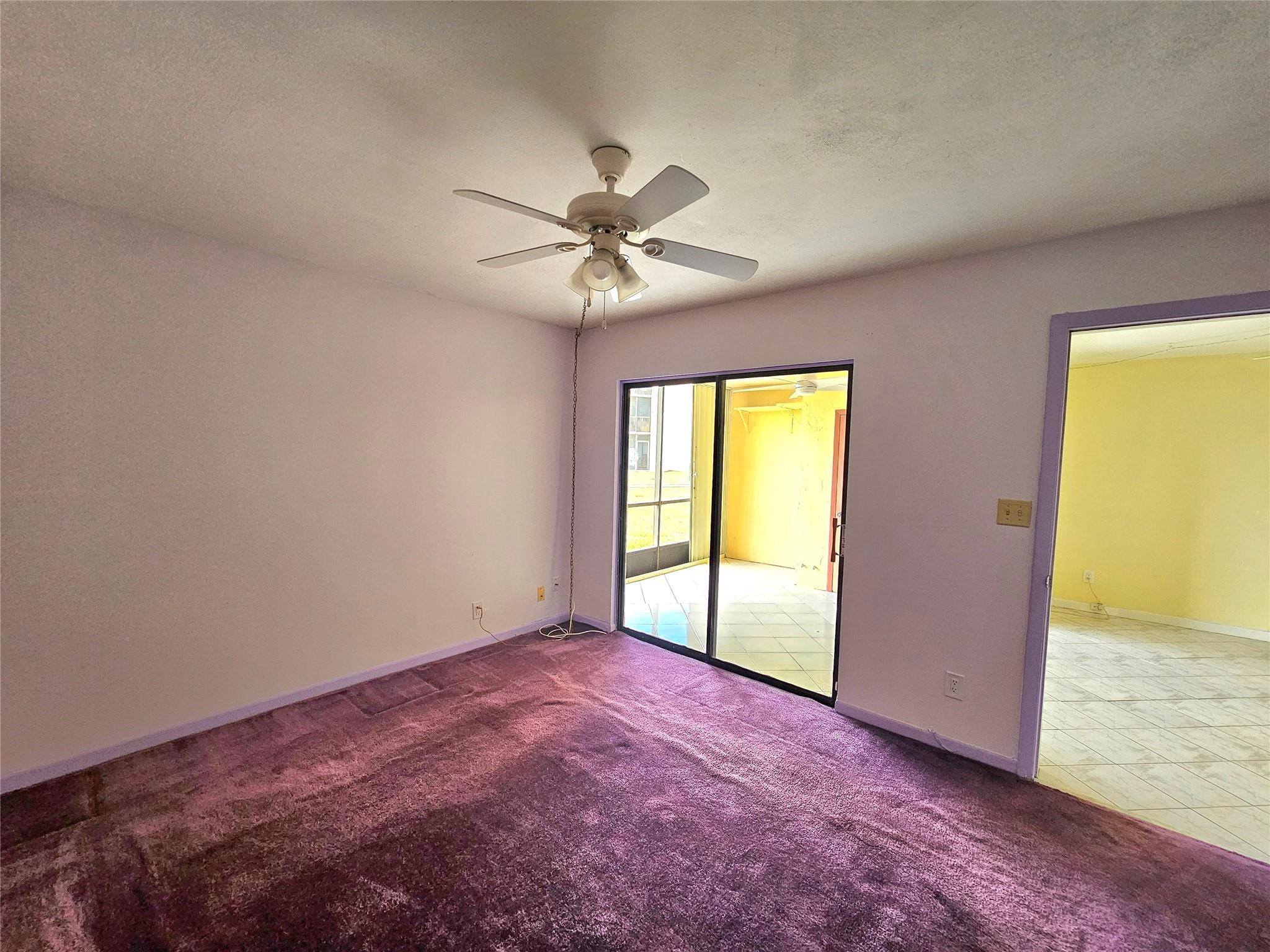 3396 Foxcroft Road, Unit 110 Miramar, FL 33025 - Photo 12 of 24 a view of an empty room with a window