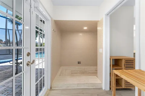 a view of an entryway with livingroom