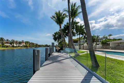 a view of a lake with a garden