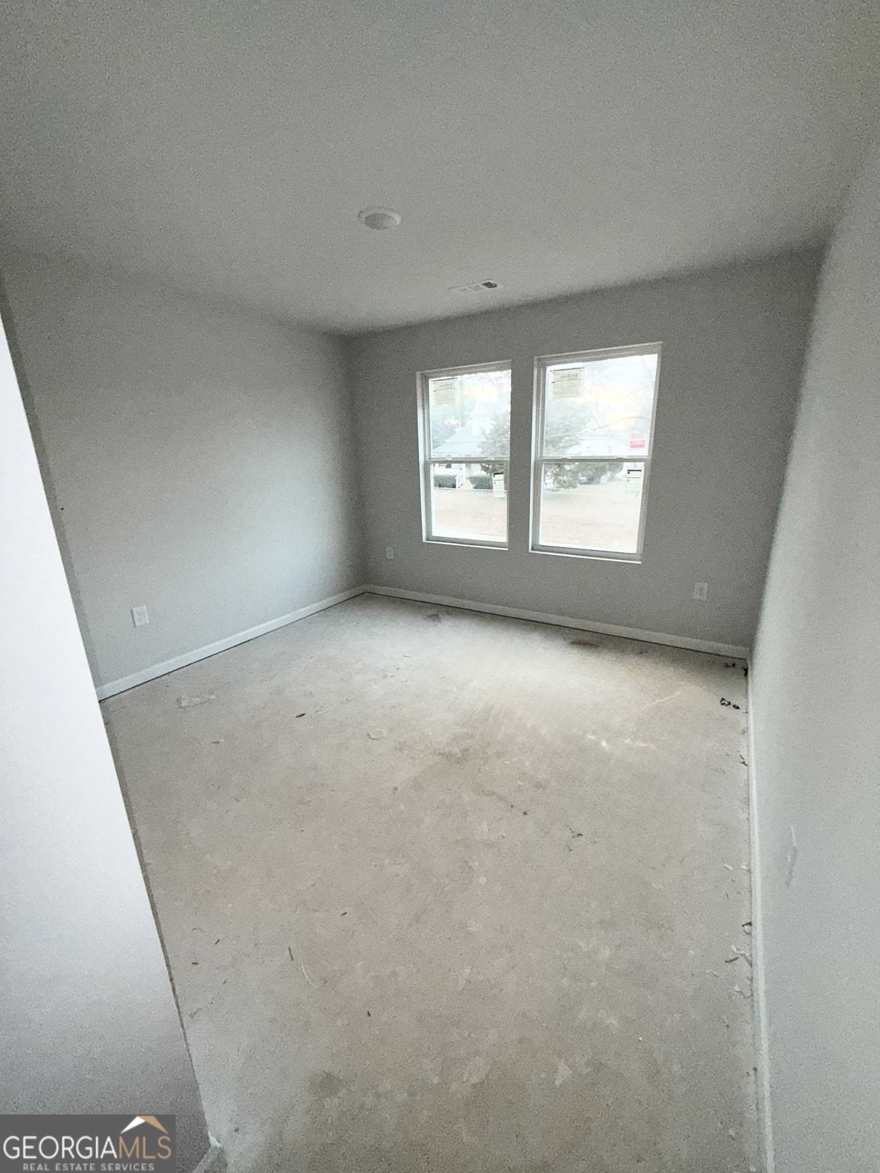 11604 East Lovejoy Road Hampton, GA 30228 - Photo 22 of 22 a view of empty room with windows