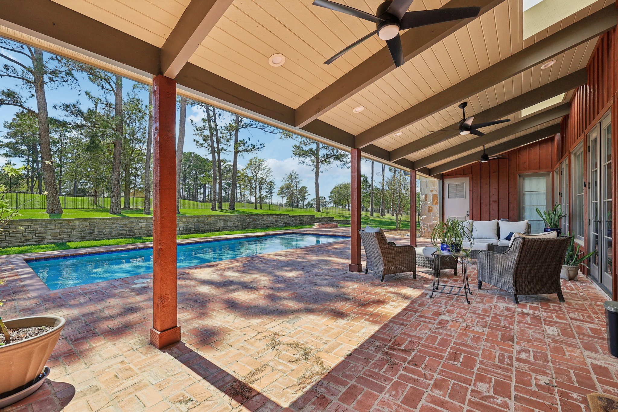 546 McAllister Road Bastrop, TX 78602 - Photo 25 of 40 Swimming pool featuring an outdoor lounge area, a patio, and a yard