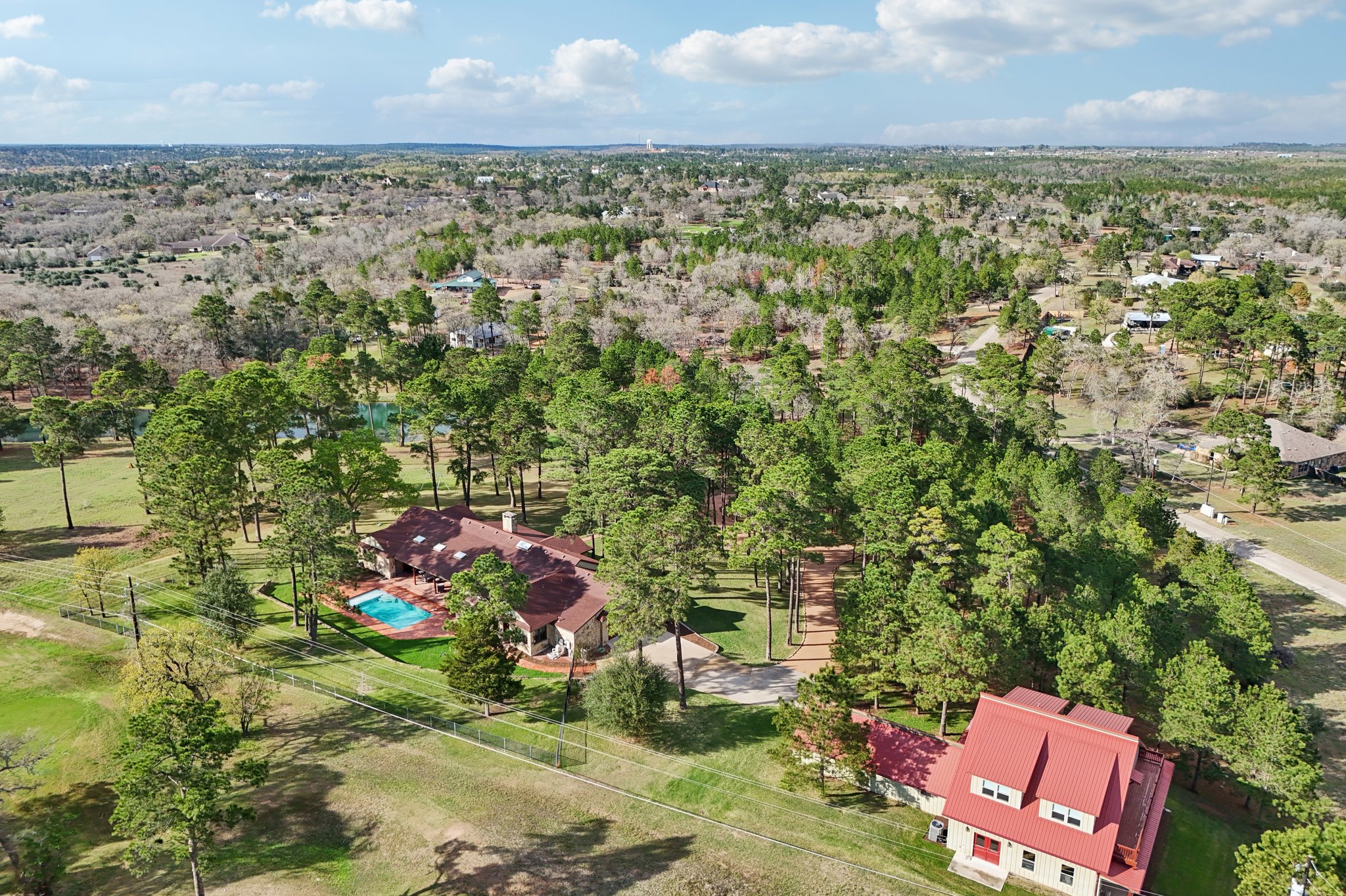 546 McAllister Road Bastrop, TX 78602 - Photo 28 of 40 an aerial view of a houses with yard