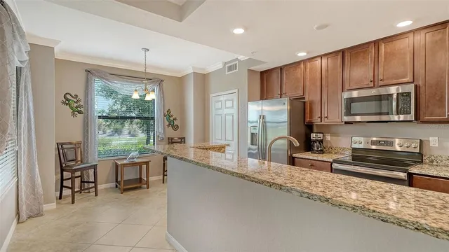 $390,000 | 5538 Palmer Circle, Unit 103, Bradenton, FL 34211