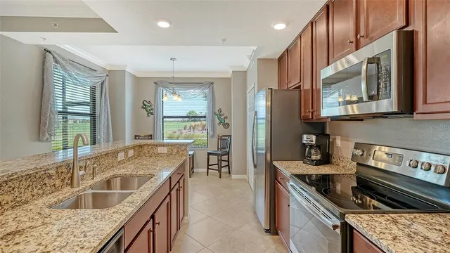 $390,000 | 5538 Palmer Circle, Unit 103, Bradenton, FL 34211