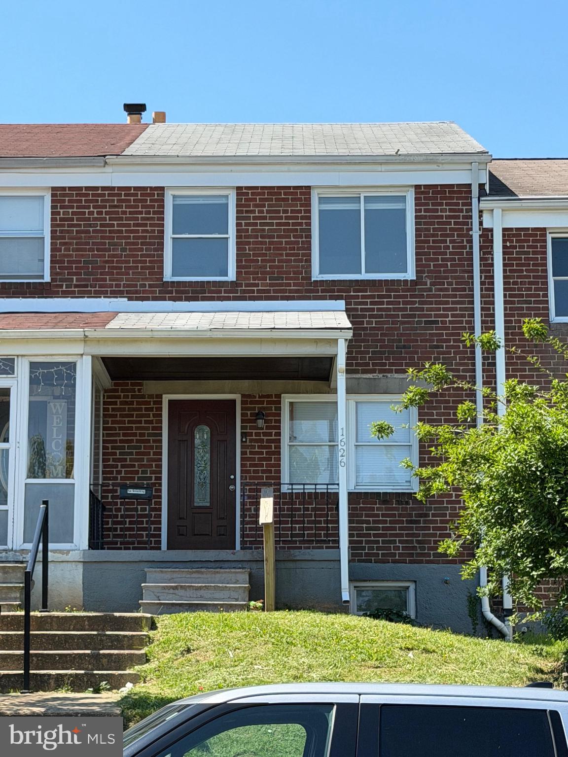 1626 Inverness Avenue Baltimore, MD 21230 - Photo 1 of 19 a view of a brick building with many windows