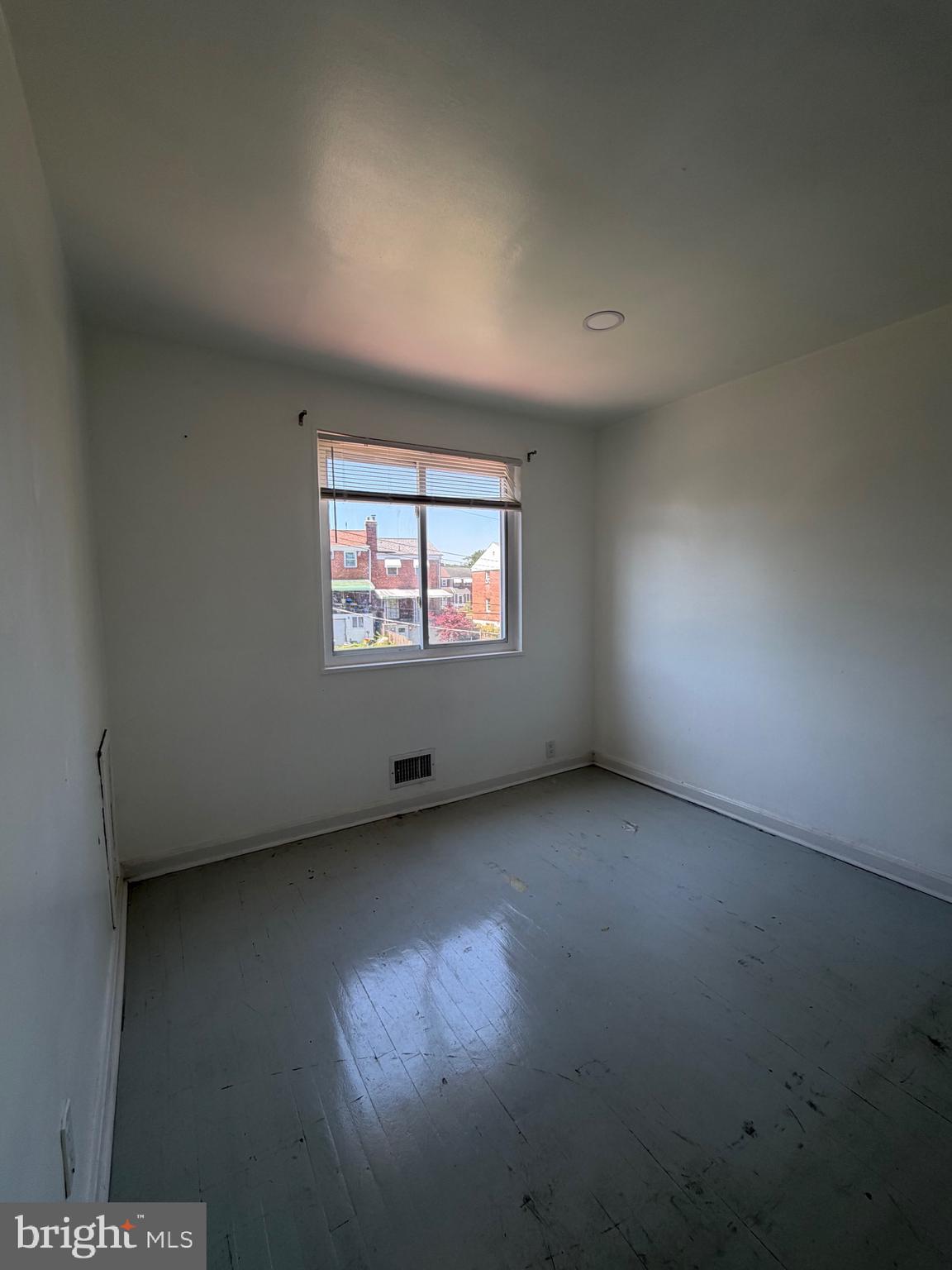 1626 Inverness Avenue Baltimore, MD 21230 - Photo 13 of 19 an empty room with a window