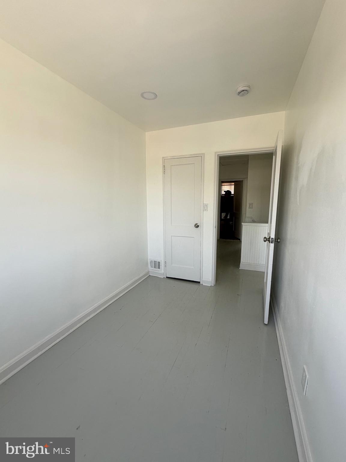1626 Inverness Avenue Baltimore, MD 21230 - Photo 16 of 19 an empty room with a bathroom