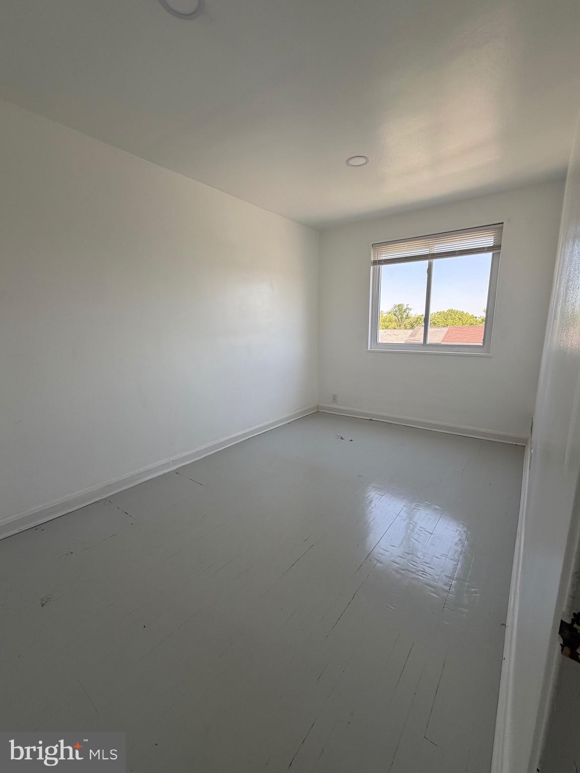 1626 Inverness Avenue Baltimore, MD 21230 - Photo 17 of 19 an empty room with a window