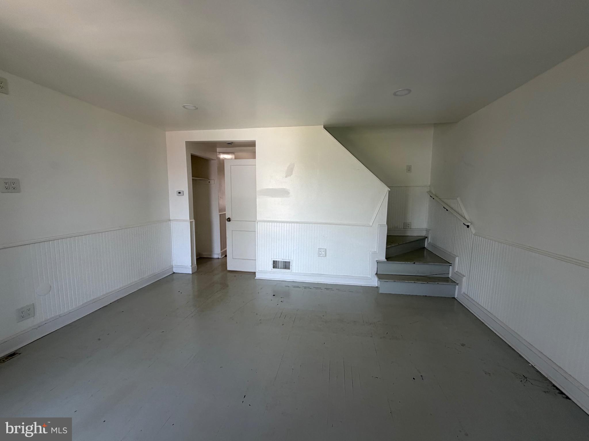 1626 Inverness Avenue Baltimore, MD 21230 - Photo 18 of 19 an empty room with a empty space and windows