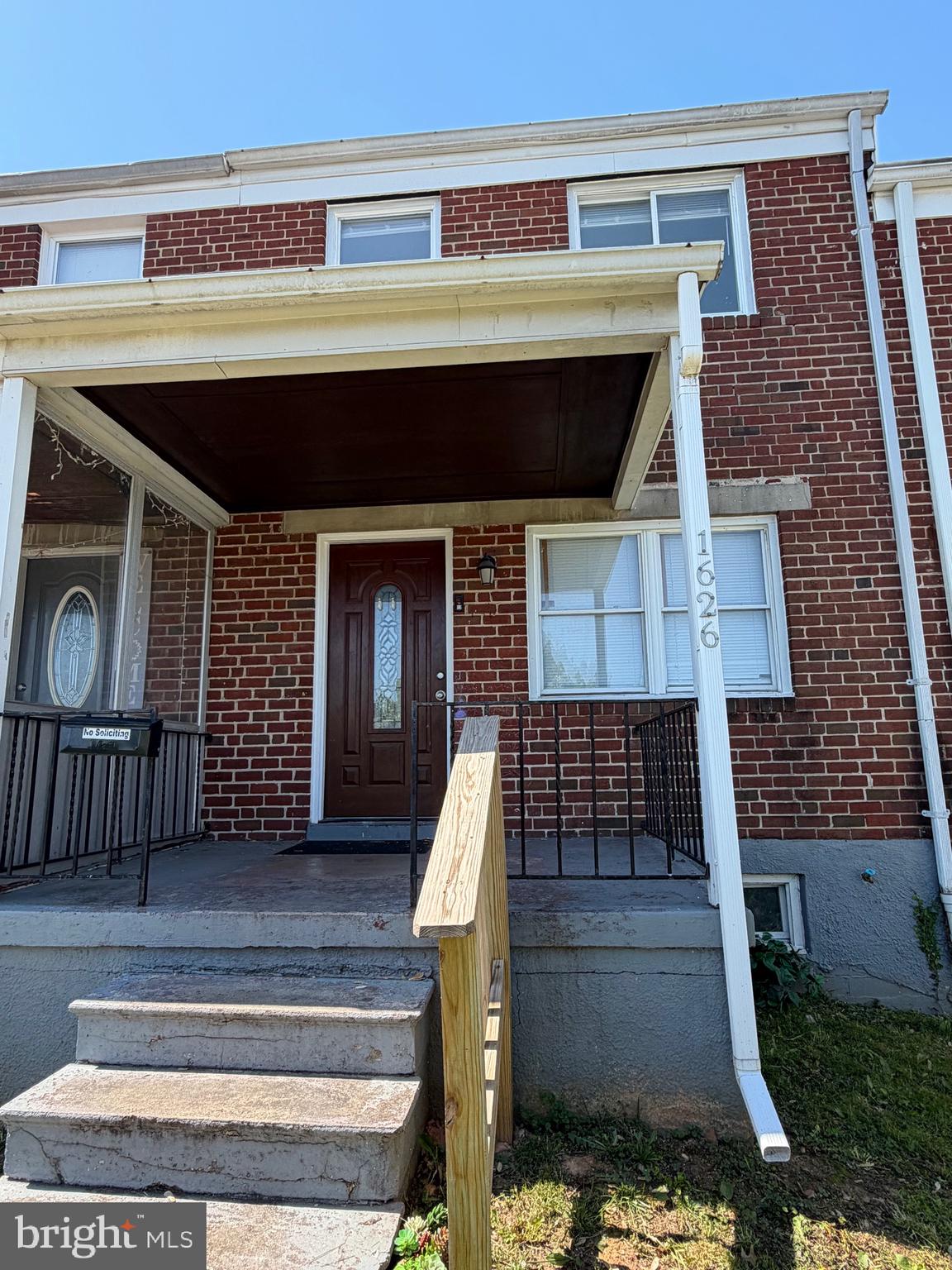 1626 Inverness Avenue Baltimore, MD 21230 - Photo 2 of 19 a front view of a house with large windows