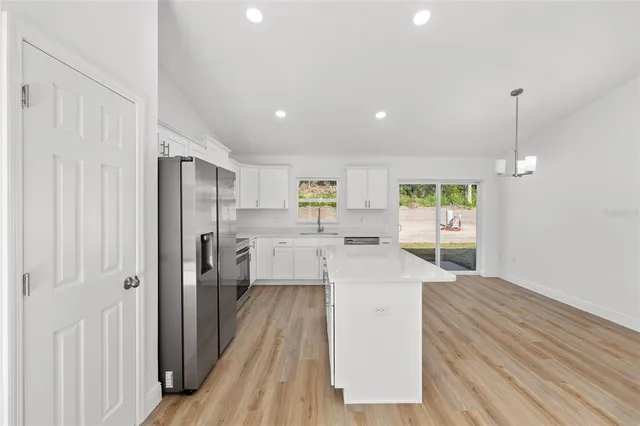 a large kitchen with a lot of counter space