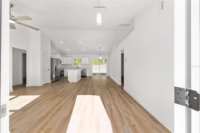 a view of a living room with a bed