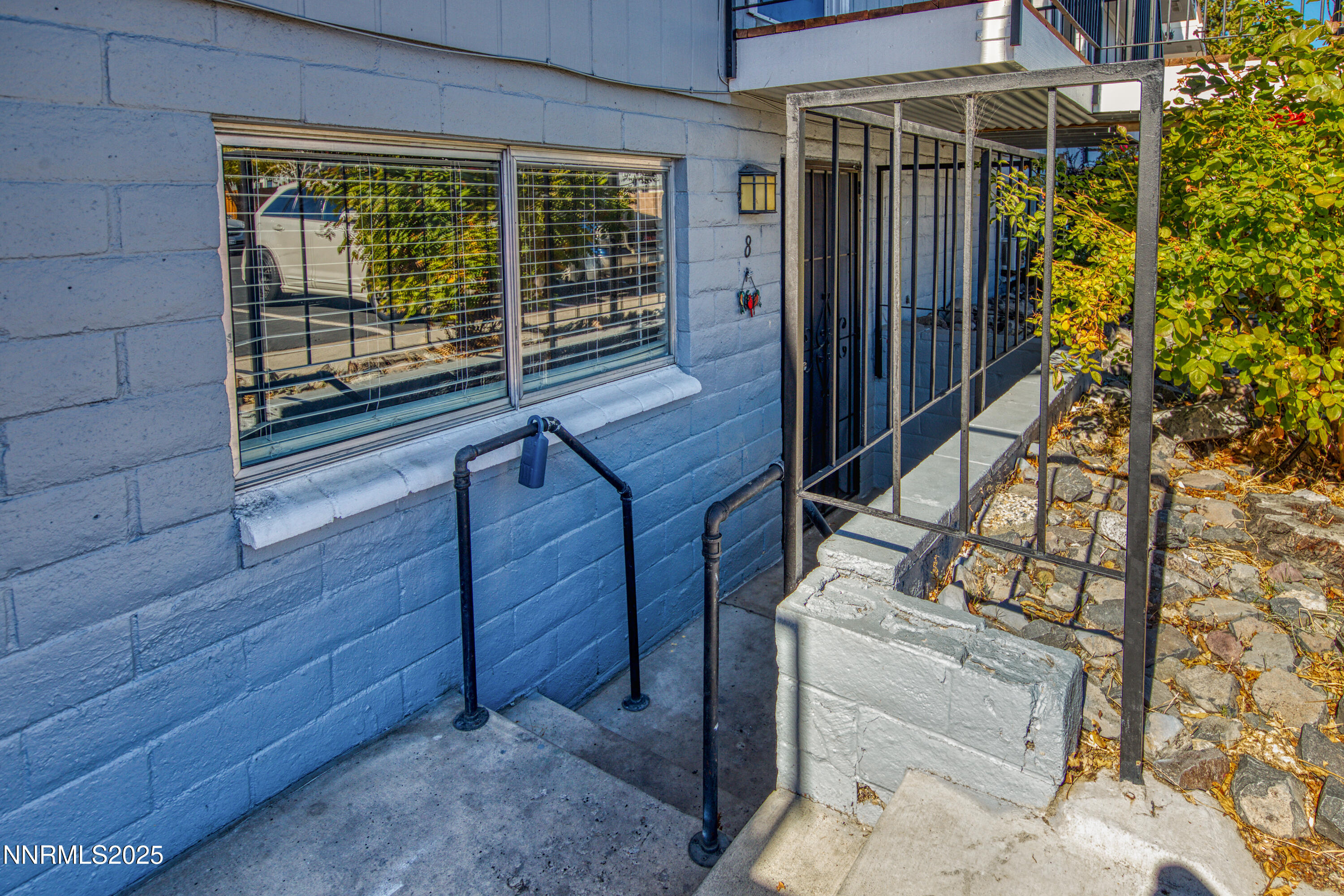 1436 East 9th Street, Unit 8 Reno, NV 89512 - Photo 18 of 19 a view of entryway with a wooden door
