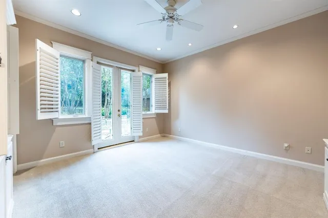 a kitchen with granite countertop a sink and wooden floor