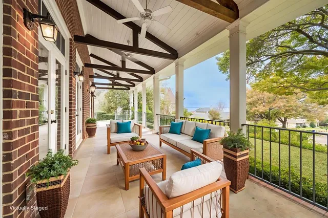 a view of a porch with wooden floor