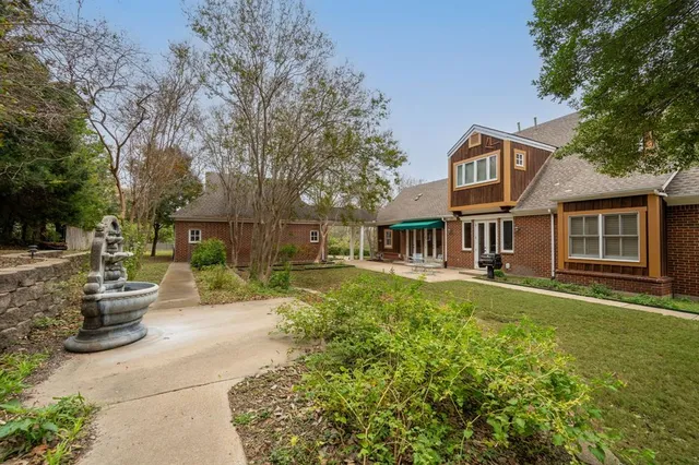 a view of a swimming pool with a patio