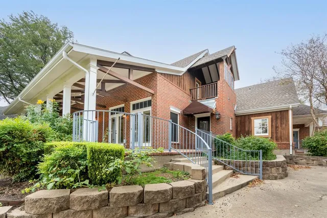 front view of a house with a small yard
