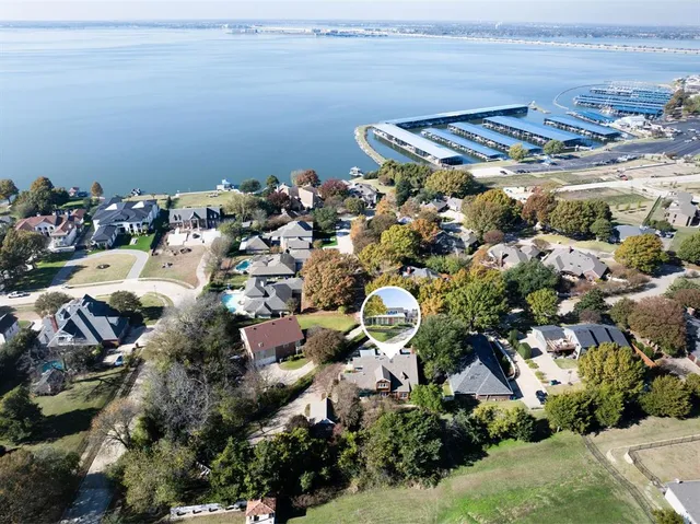 a view of a balcony with wooden floor