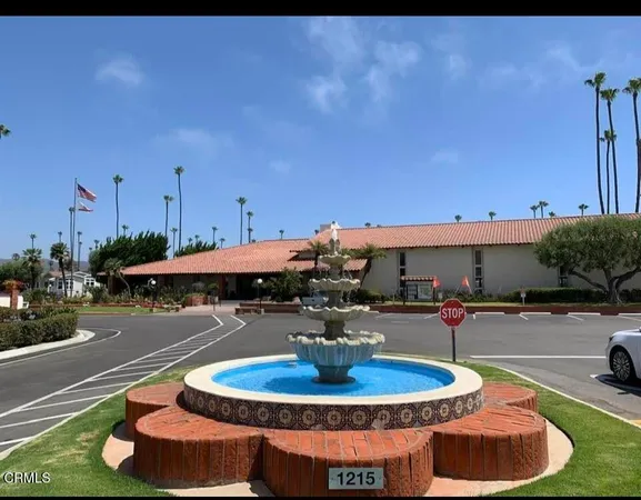 a swimming pool with outdoor seating